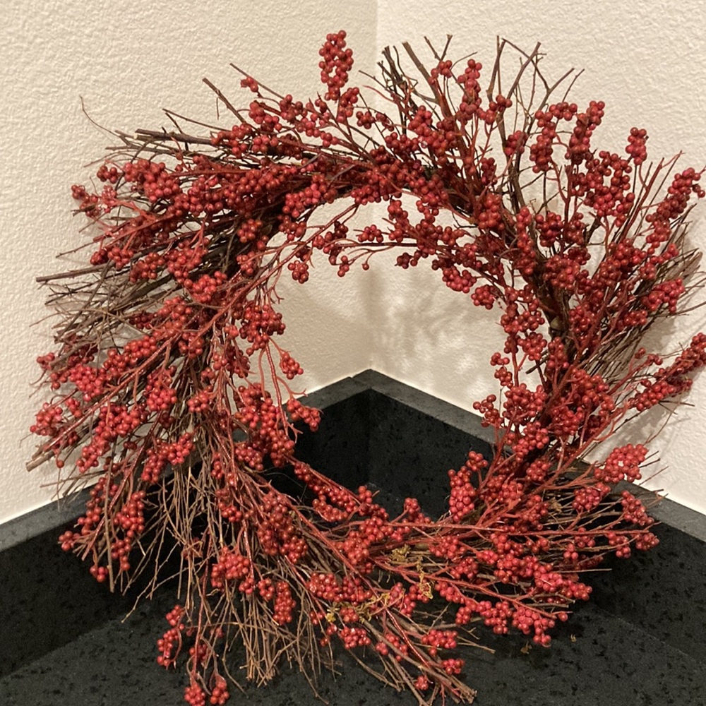Grapevine wreath with red berries